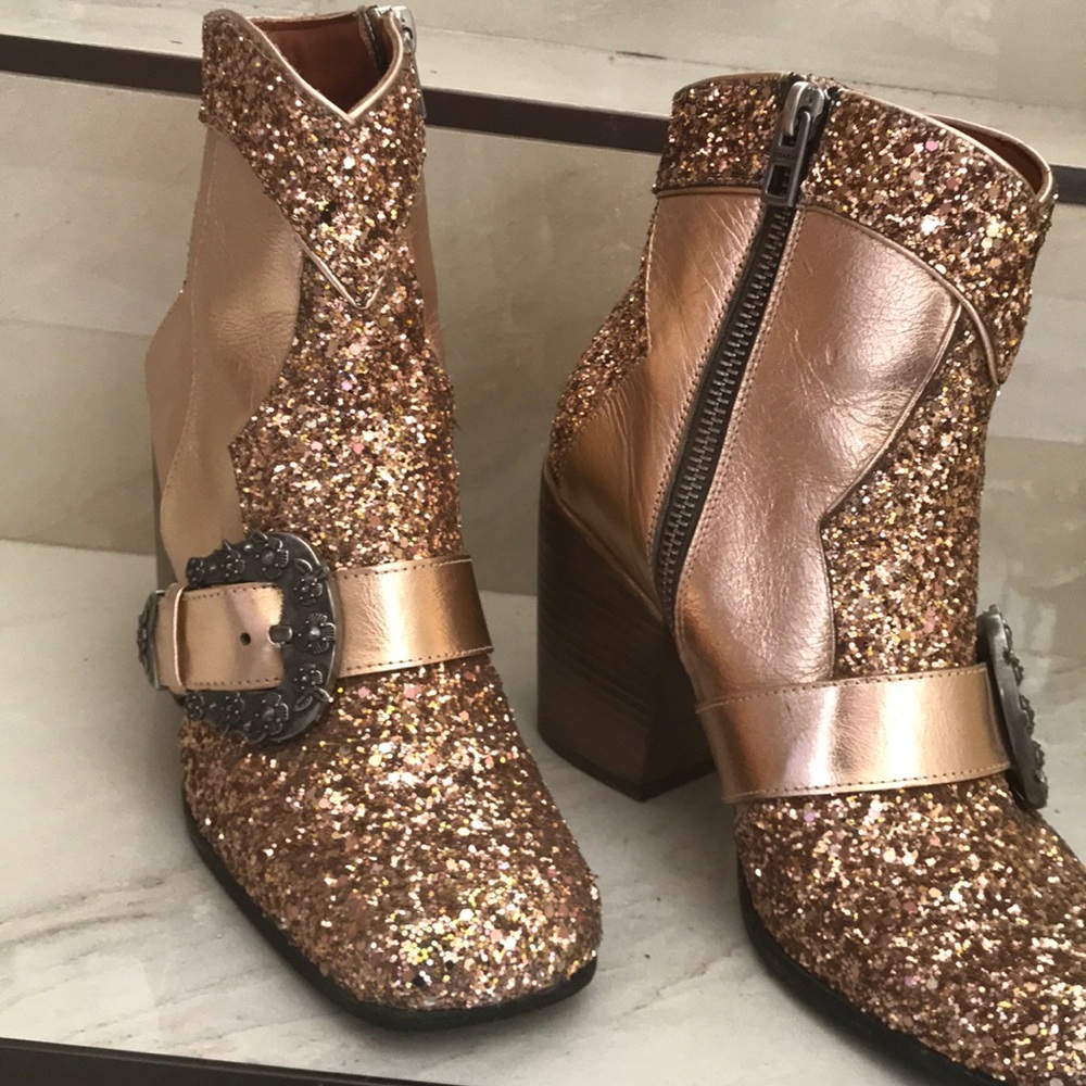 Coach beautiful western  boots.  Worn once. The heel is super comfortable.